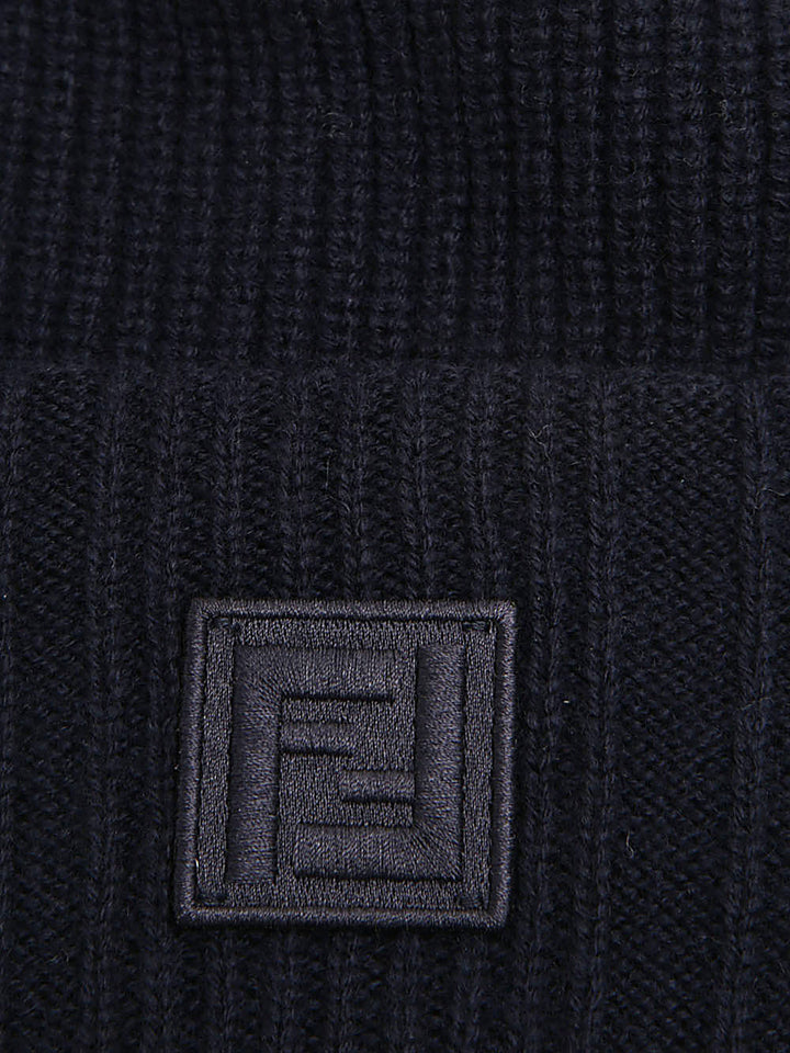 Beanie
Cappello in lana e cashmere blu