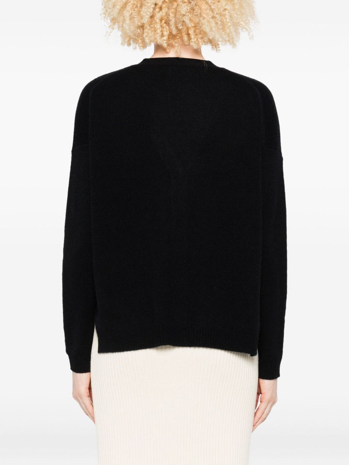 Allude

Black cashmere sweater with V-neck