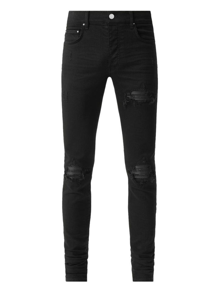 AMIRI
Jeans MX1 con strappi