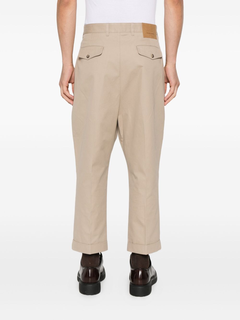 AMI Paris
pleated cotton trousers