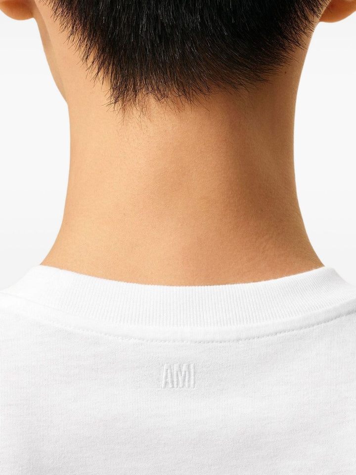 AMI Paris
T-shirt in cotone biologico con ricamo a cuore