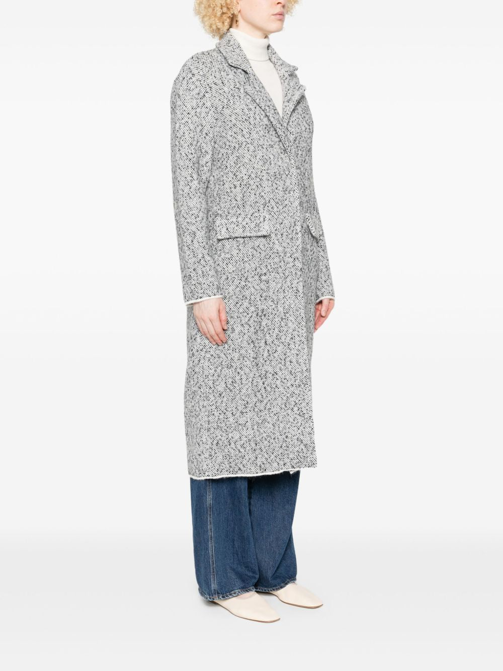 Anneclaire
Cappotto in tweed bianco maculato