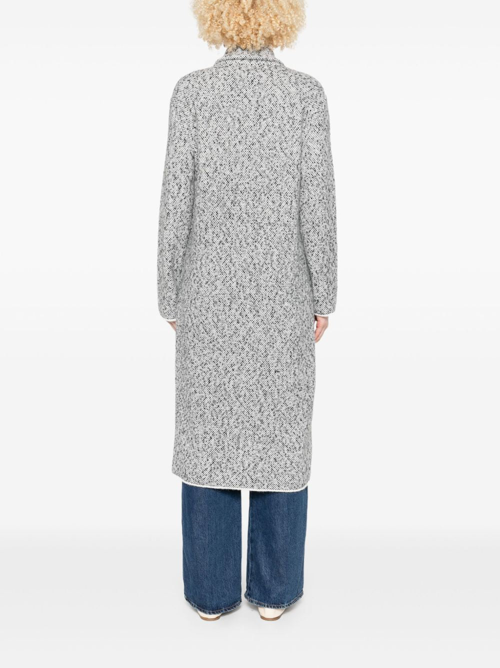 Anneclaire
Cappotto in tweed bianco maculato