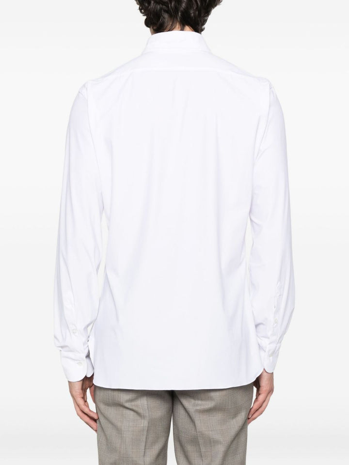 Barba
Camicia a maniche lunghe