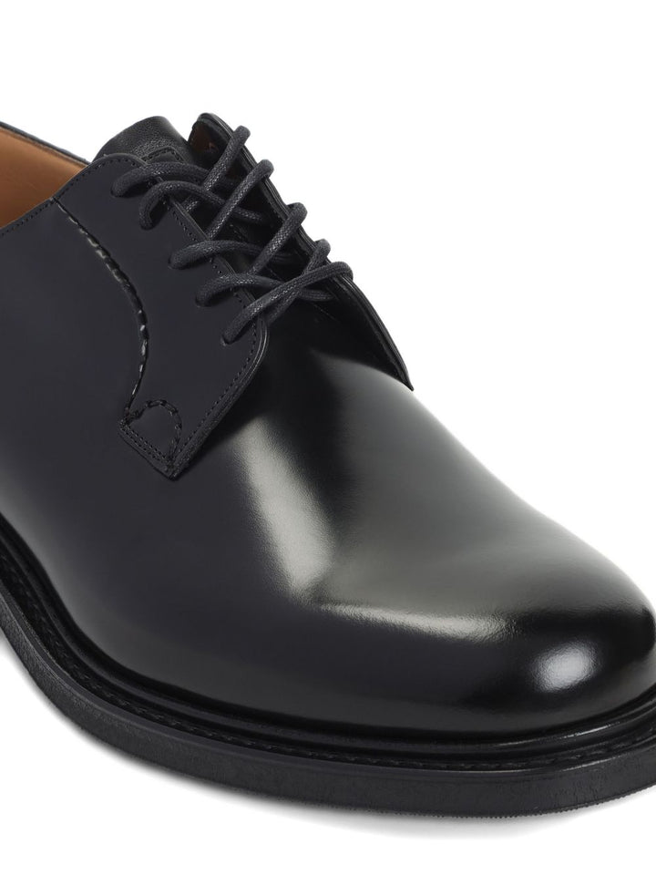 Church's
Derby in pelle