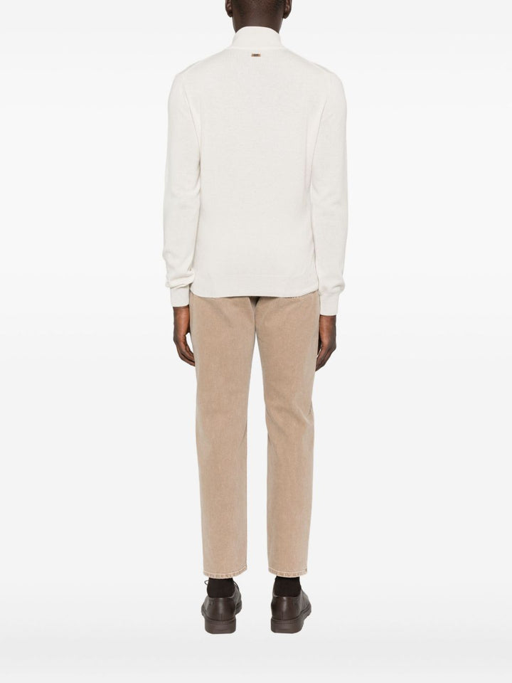 Corneliani
Maglione beige con mezza zip