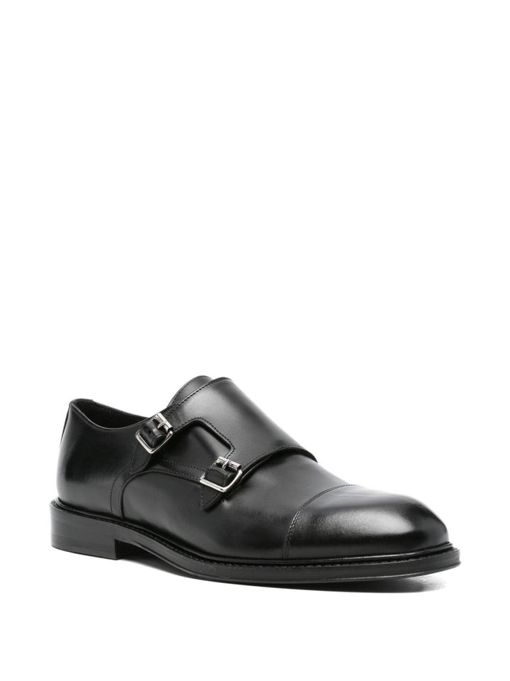 Corneliani
Scarpa in pelle nera con doppia fibbia