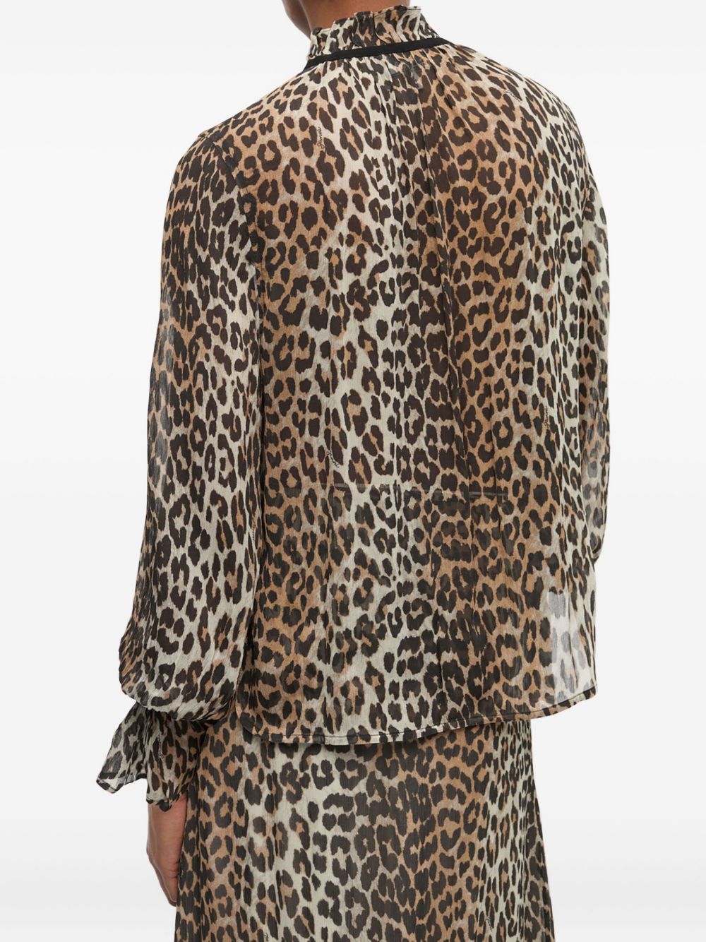 GANNI
Blusa con stampa