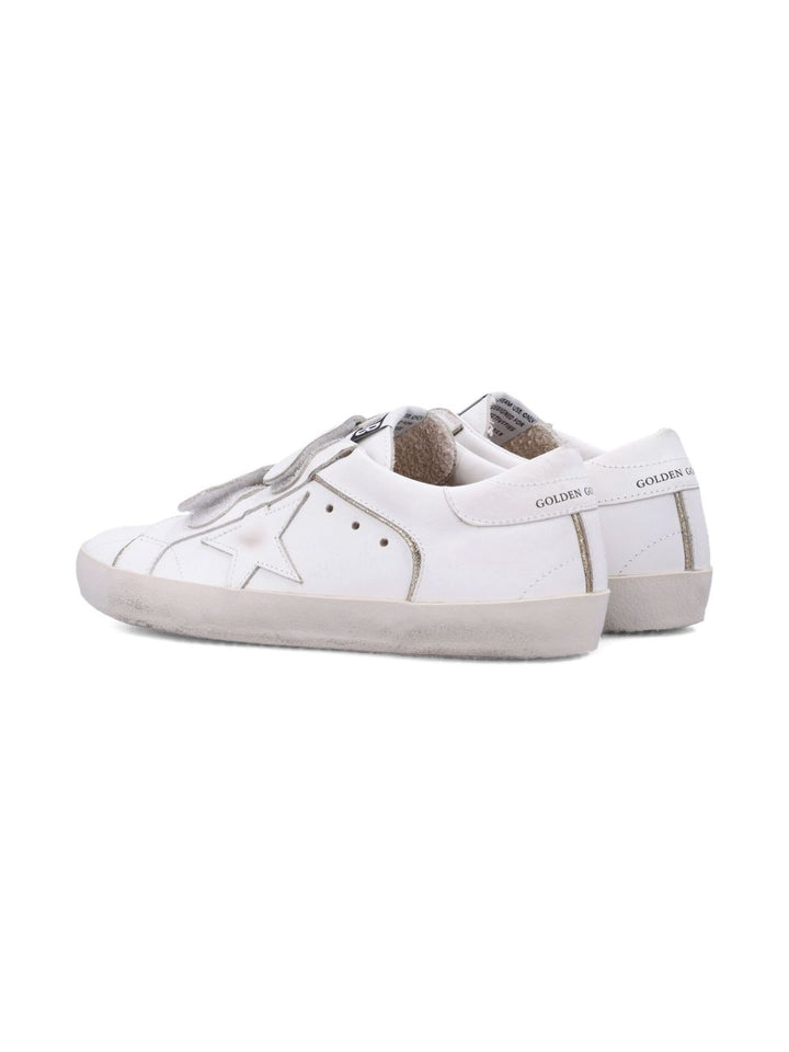 Golden Goose Kids
Sneakers con cinturino a strappo e stella