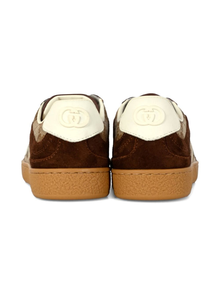 Gucci Kid
Tessuto GG beige e marrone scuro
