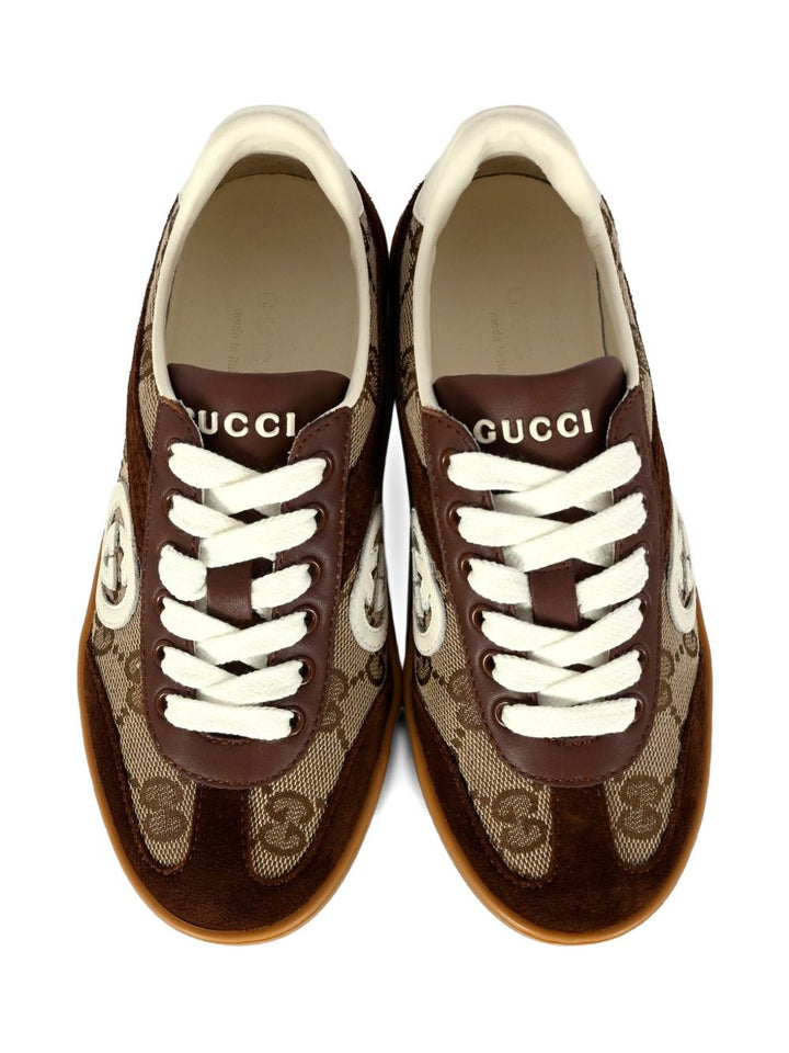 Gucci Kid
Tessuto GG beige e marrone scuro