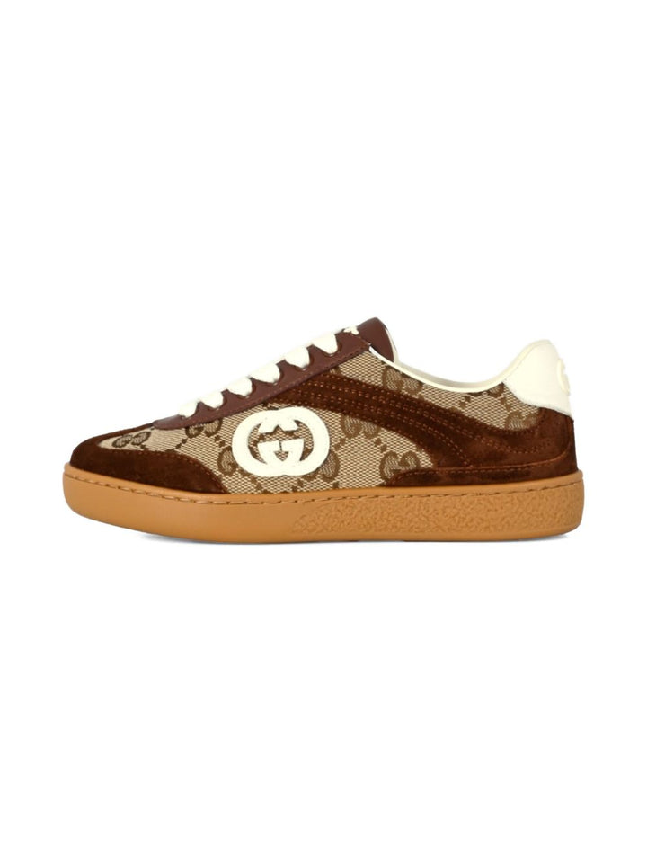 Gucci Kid
Tessuto GG beige e marrone scuro