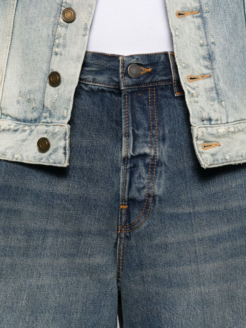Haikure
Pantaloni blu a vita alta