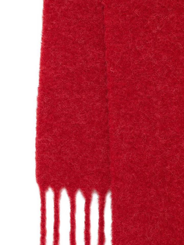Jacquemus
Sciarpa rossa lavorata a maglia