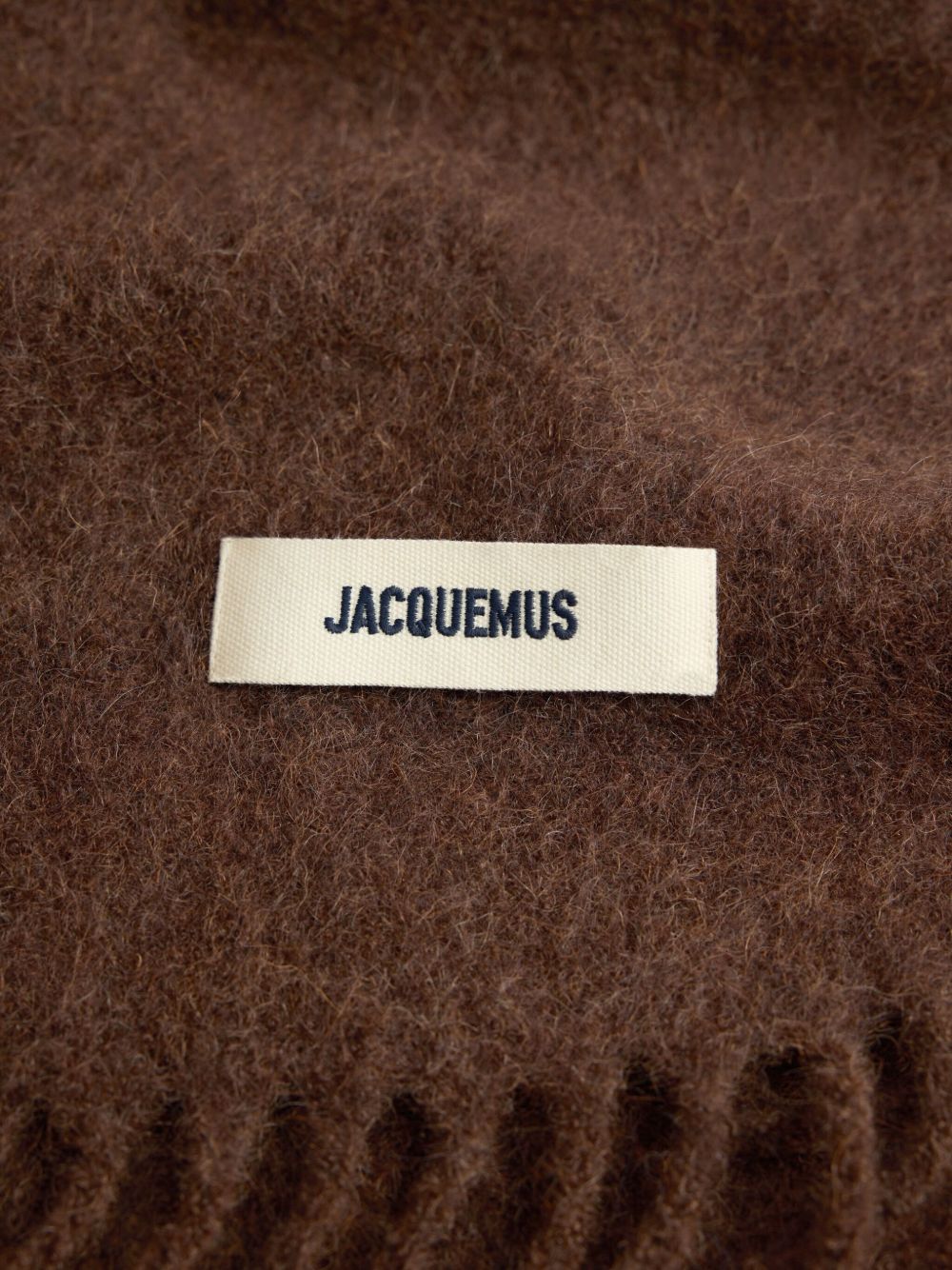 Jacquemus
Sciarpa con applicazione