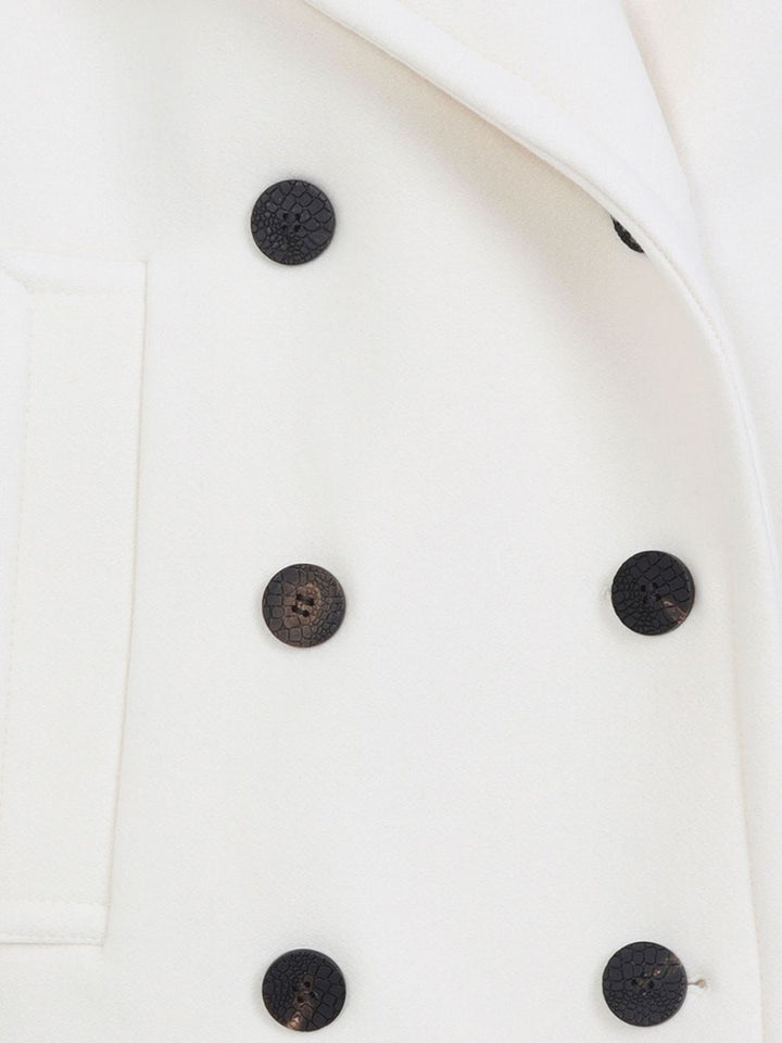 Jacquemus
Cappotto doppiopetto in lana bianca