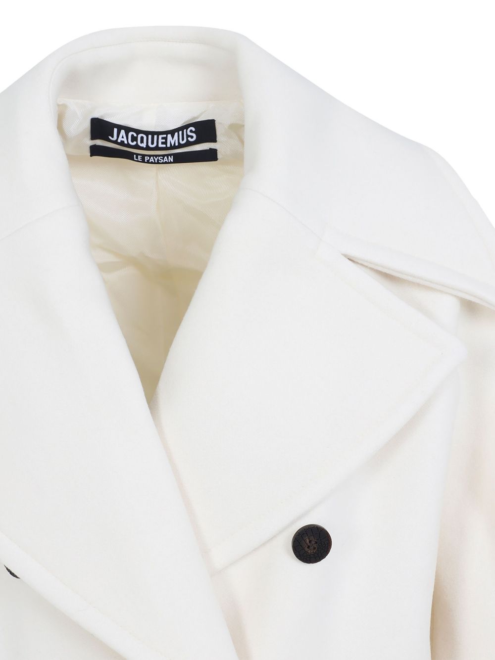 Jacquemus
Cappotto doppiopetto in lana bianca