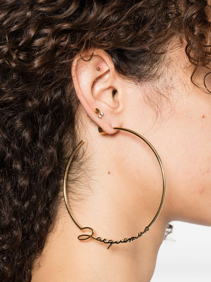 Jacquemus
Orecchini a cerchio con logo lettering