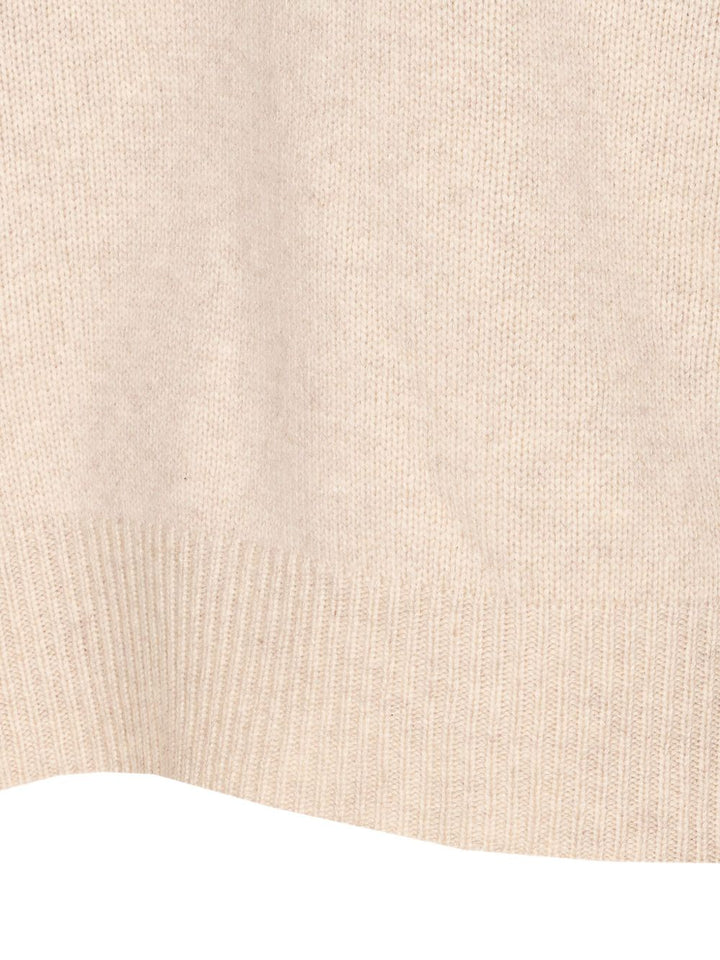 Lisa Yang
Maglione beige, girocollo