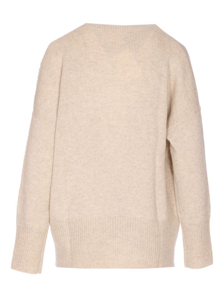 Lisa Yang
Maglione beige, girocollo