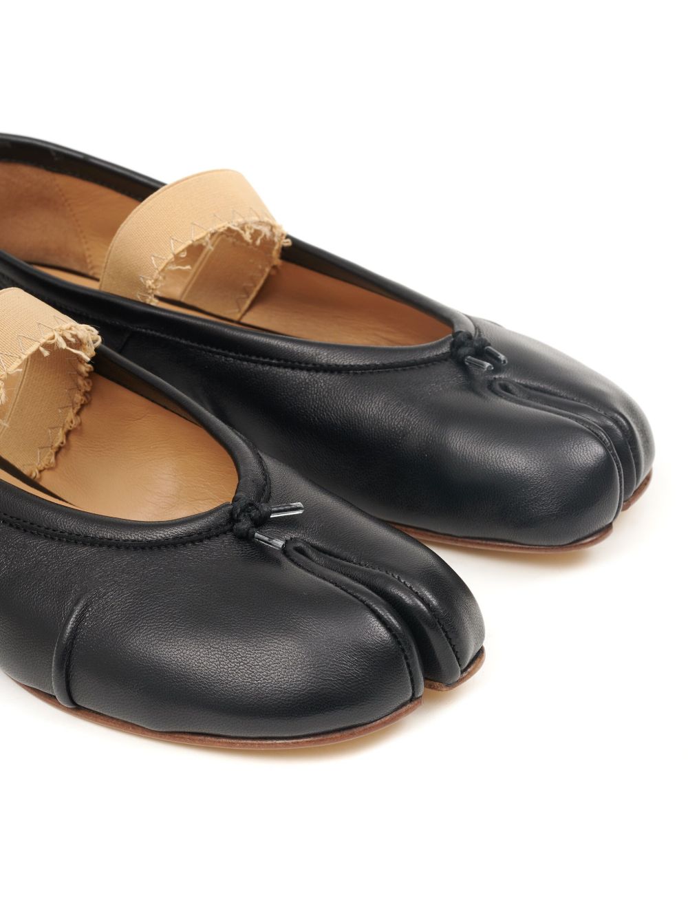 Maison Margiela
Ballerine Tabi con fascia elastica