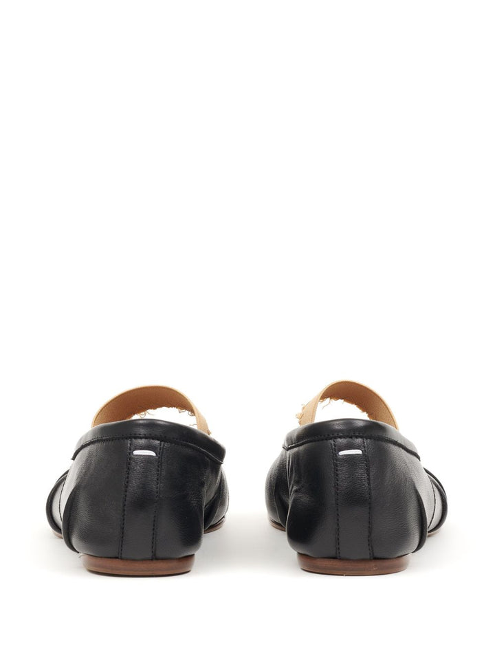 Maison Margiela
Ballerine Tabi con fascia elastica