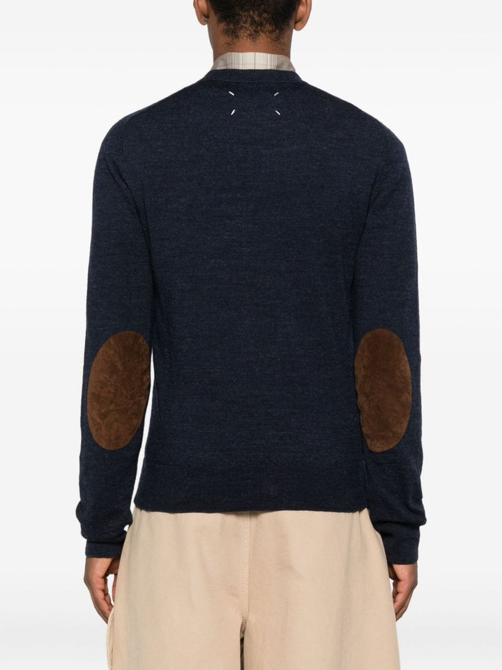 Maison Margiela
Maglione di lana blu scuro
