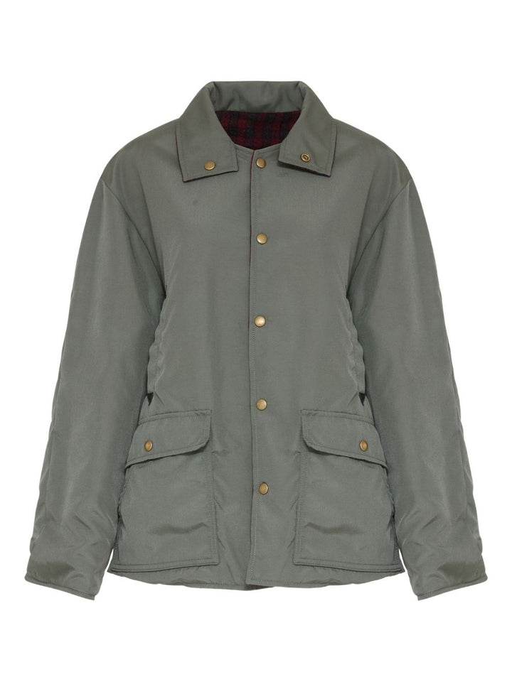 Maison Margiela
Camicia verde oliva, design trapuntato,