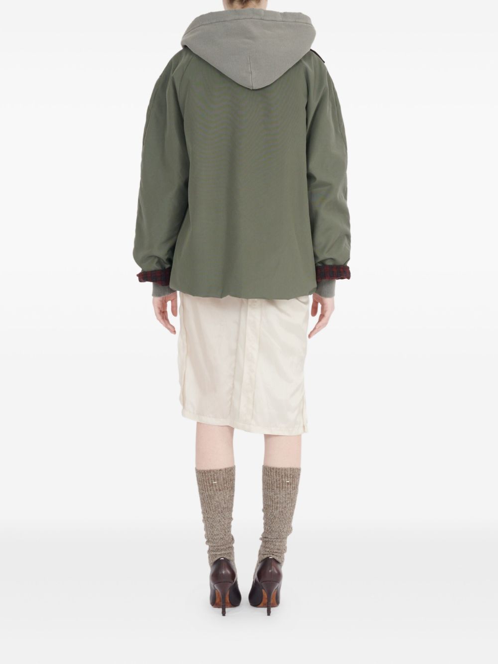 Maison Margiela
Camicia verde oliva, design trapuntato,