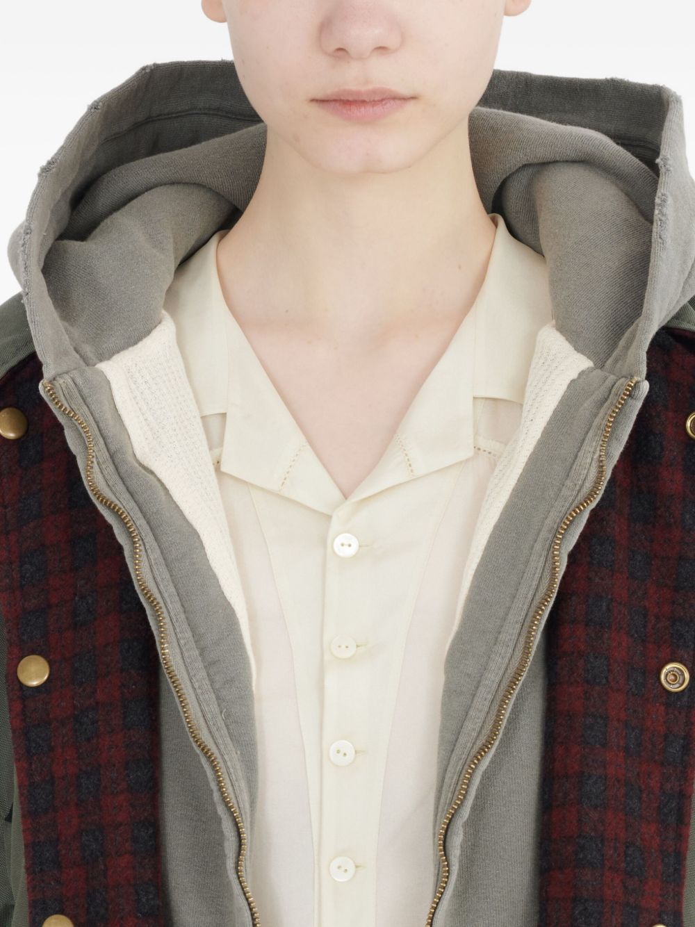 Maison Margiela
Camicia verde oliva, design trapuntato,