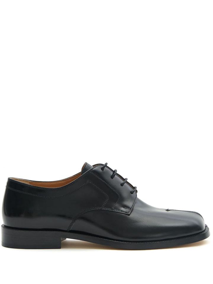 Maison Margiela
Stringate Tabi