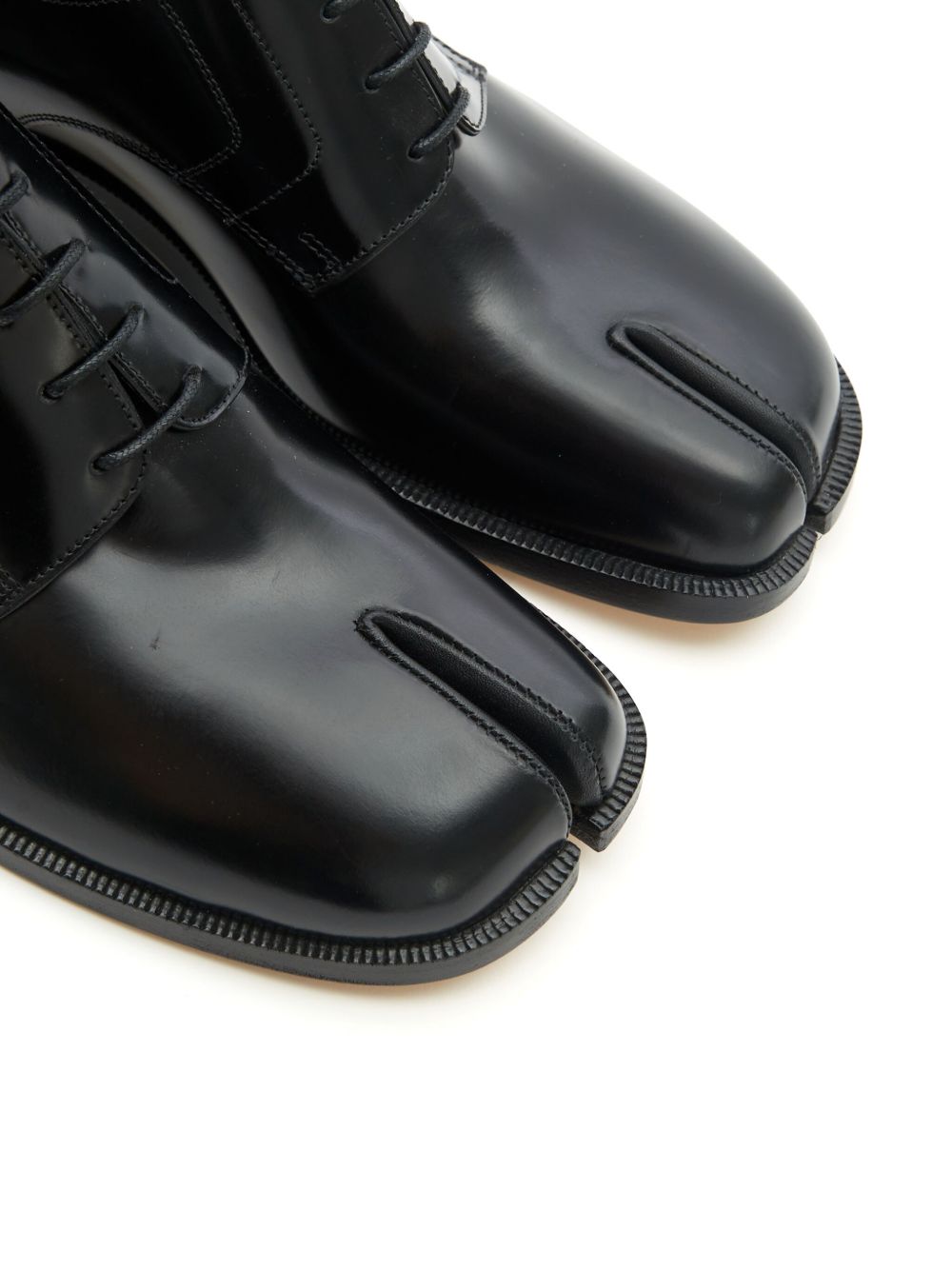 Maison Margiela
Stringate Tabi