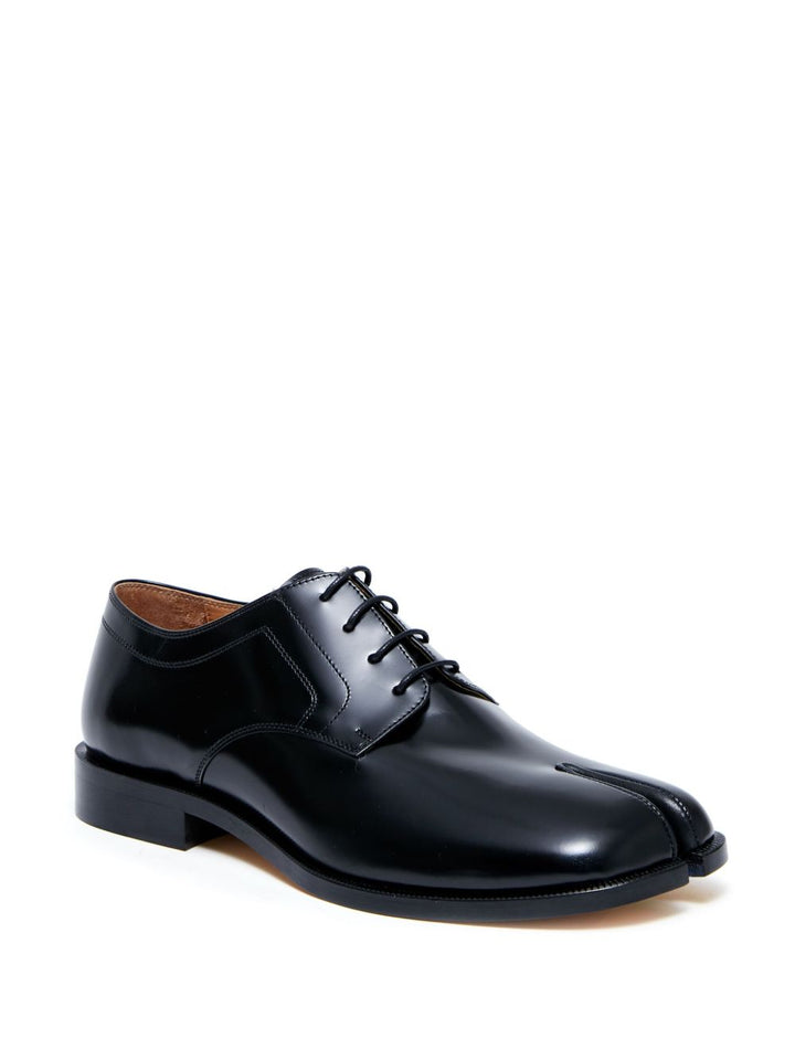 Maison Margiela
Stringate Tabi