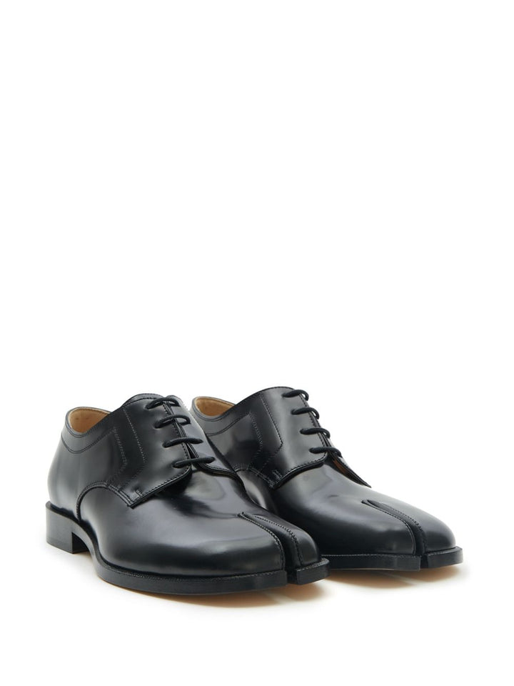 Maison Margiela
Stringate Tabi