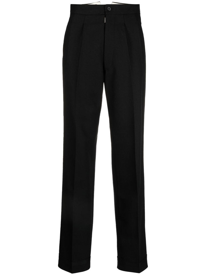 Martin Margiela
Pantaloni plissettati