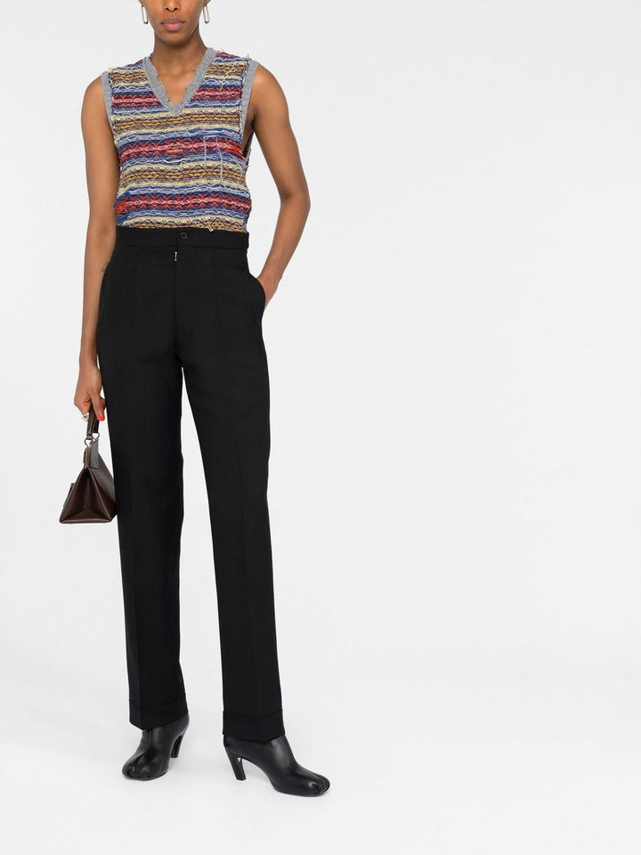 Martin Margiela
Pantaloni plissettati