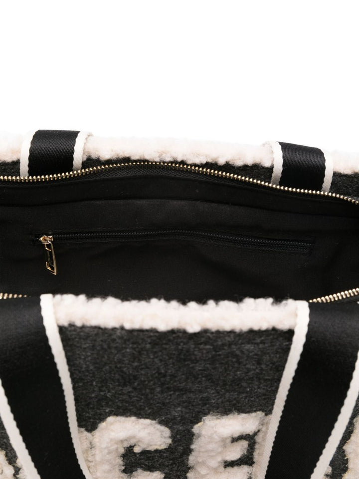 Marc Ellis Borsa a tracolla