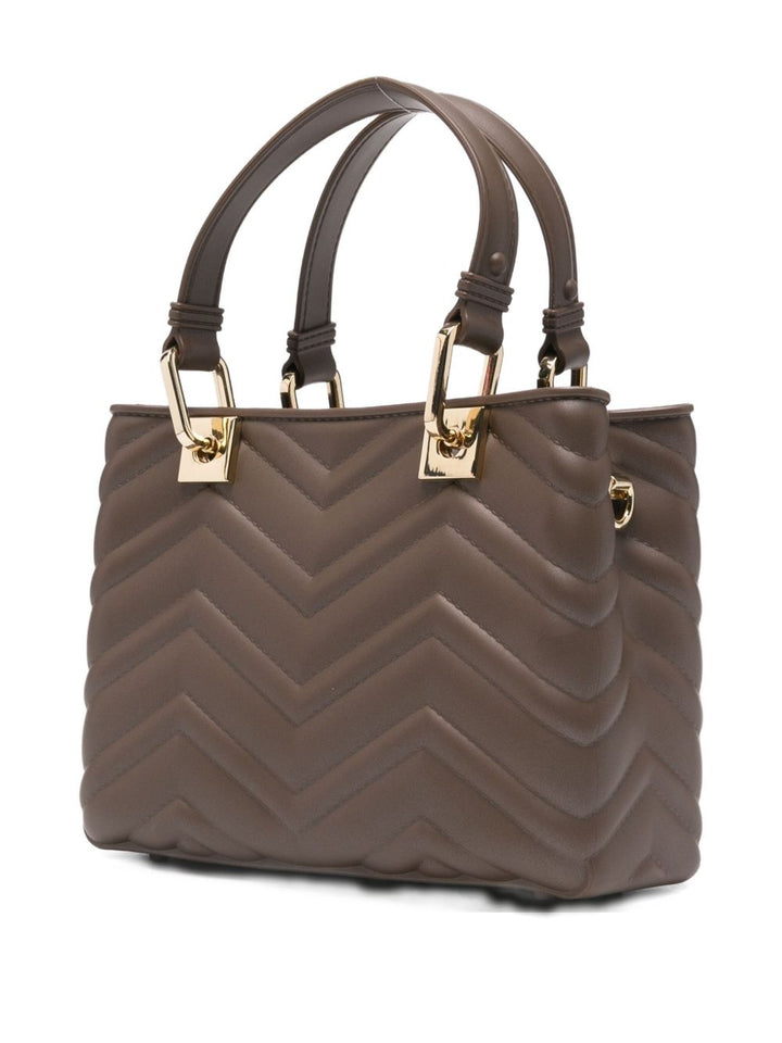 Marc Ellis
Borsa nocciola