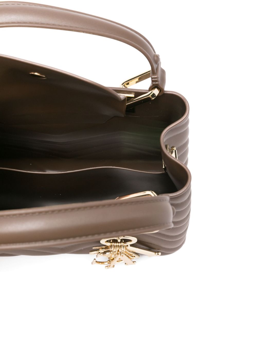 Marc Ellis
Borsa nocciola