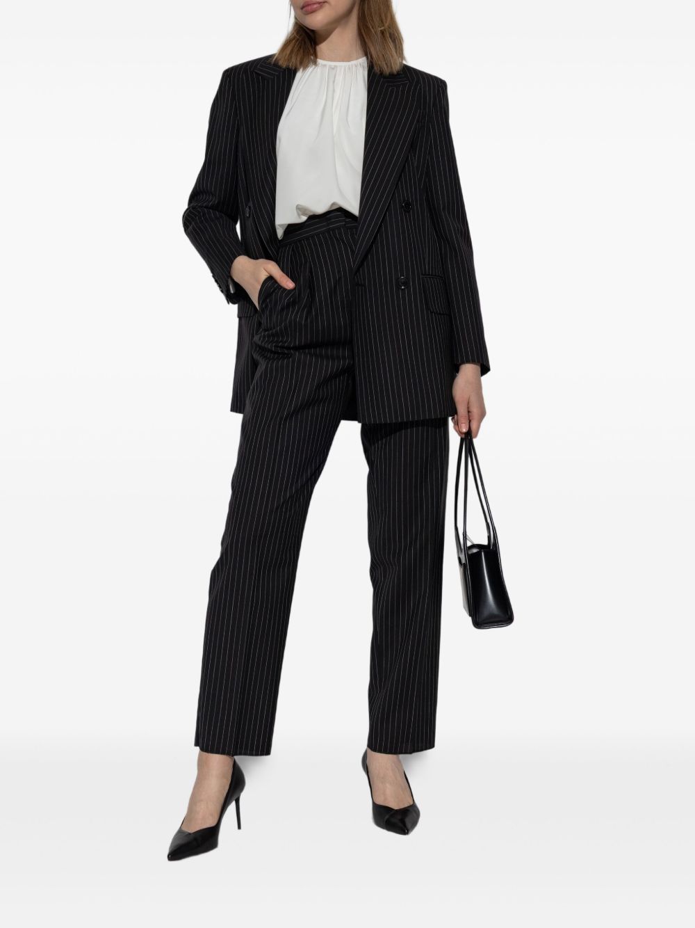 Max Mara
Pantaloni gessati in lana