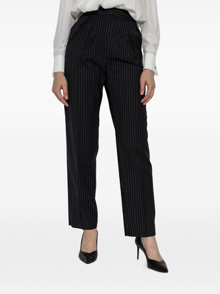 Max Mara
Pantaloni gessati in lana