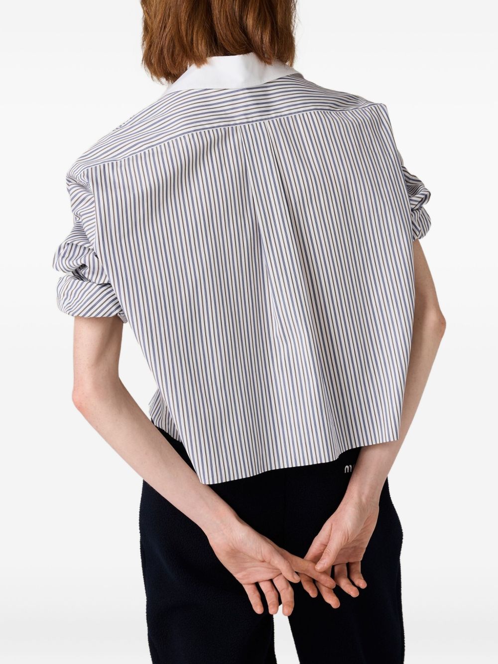 Miu Miu
Camicia a righe con ricamo
