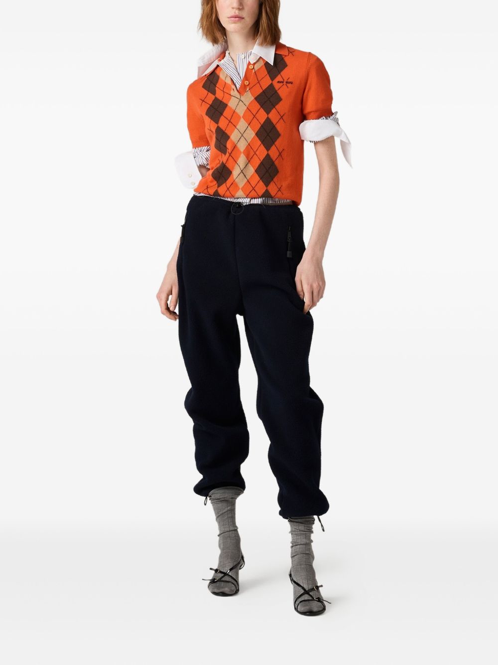 Miu Miu
Camicia a righe con ricamo