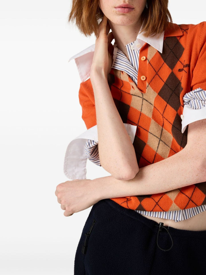 Miu Miu
Camicia a righe con ricamo