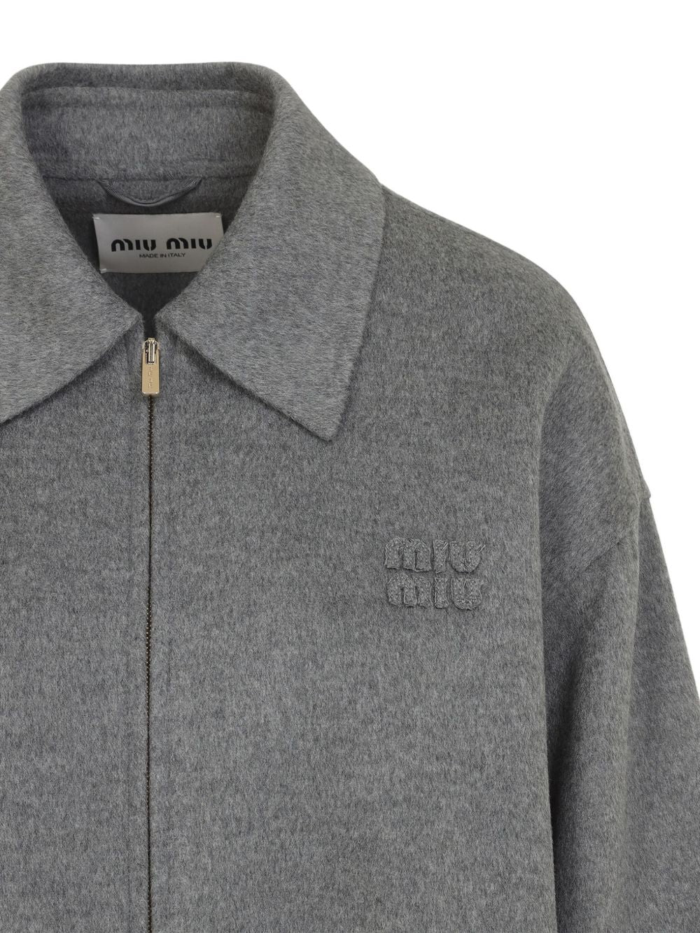 Miu Miu
Giacca in lana con logo ricamato