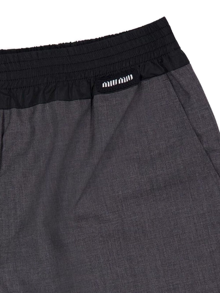Miu Miu
Shorts con vita elasticizzata