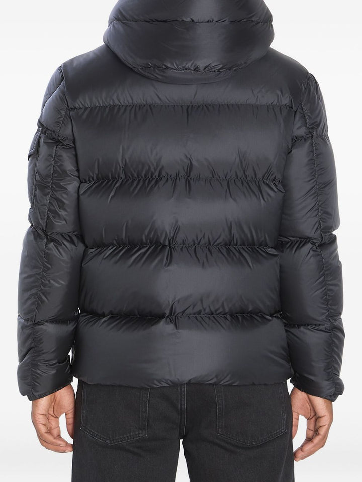 Moncler 
Piumino con cappuccio grigio