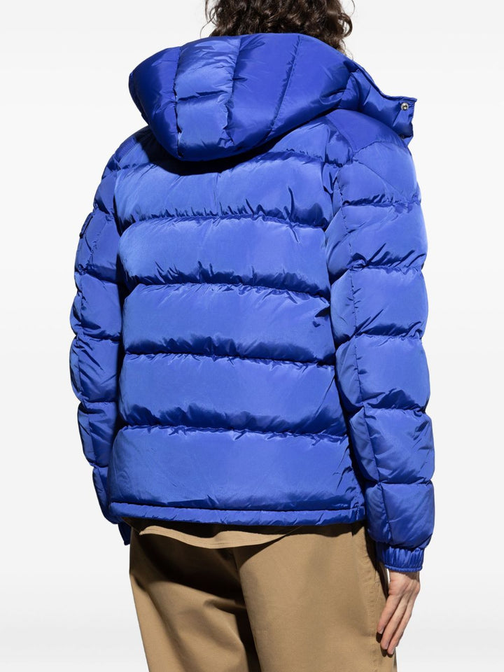 Moncler
Piumino Maya con cappuccio