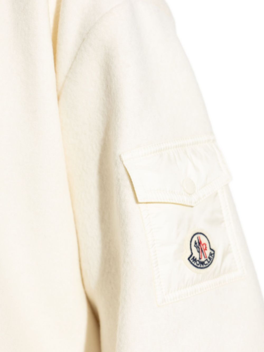 Moncler
Mantella con cappuccio