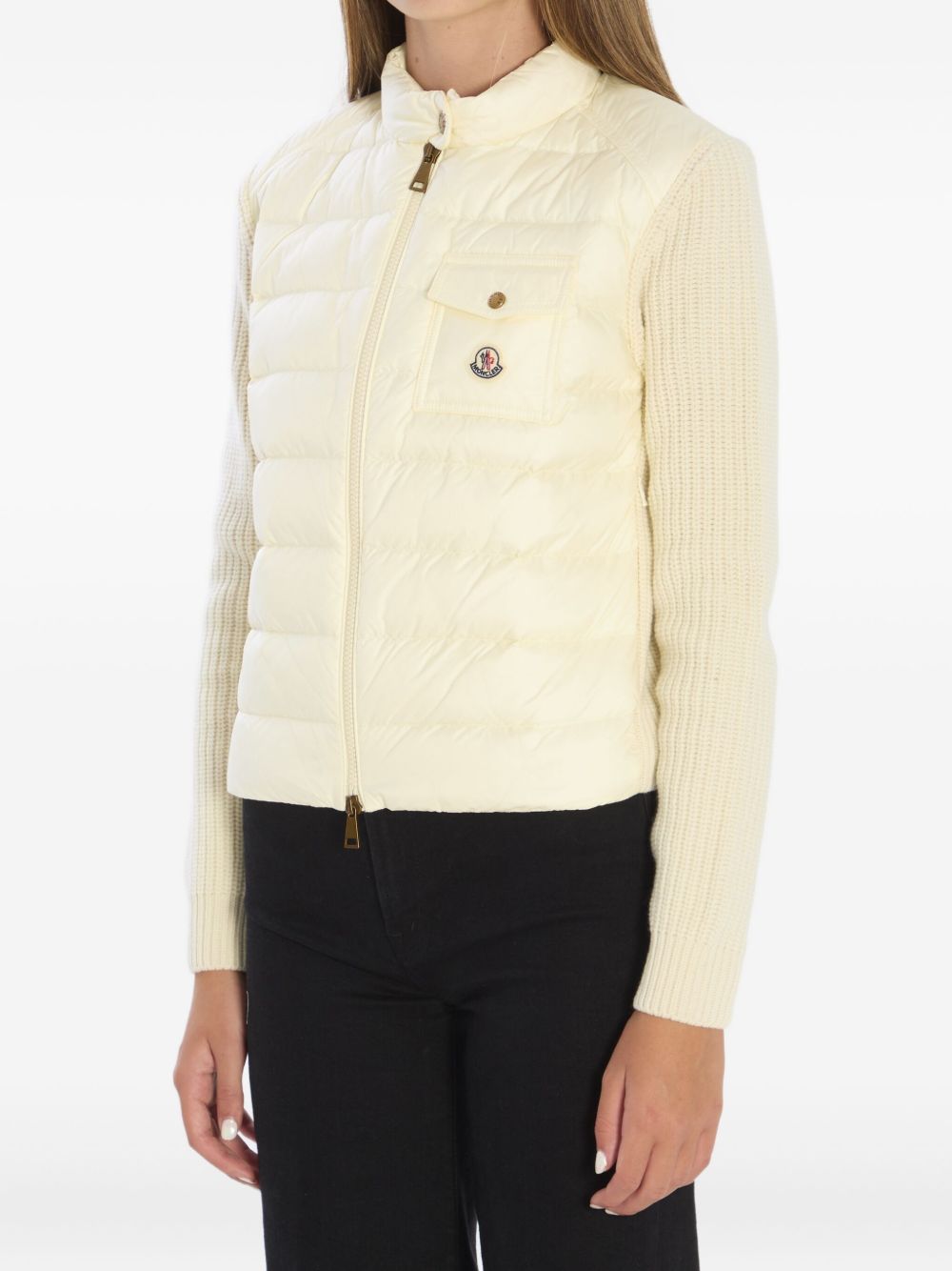 Moncler
Piumino senza maniche bianco